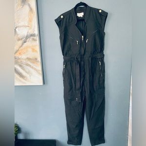 Women’s Anthropologie black Denim like Jump Suit size Small.